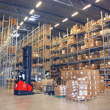 Forklift truck in a warehouse