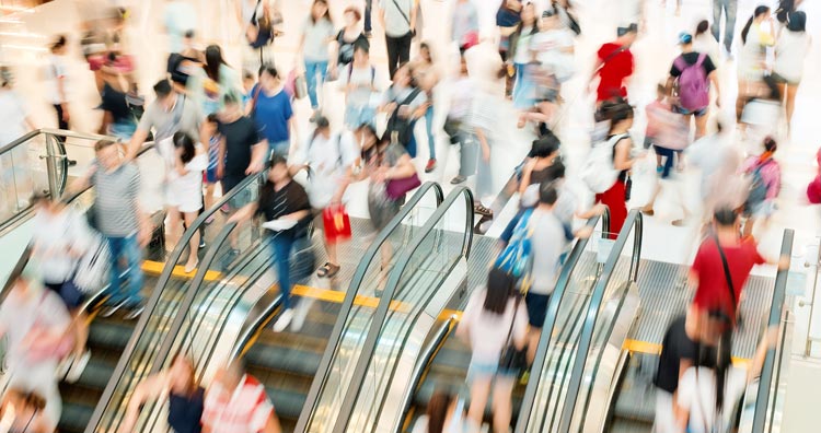 Shoppers on escalators