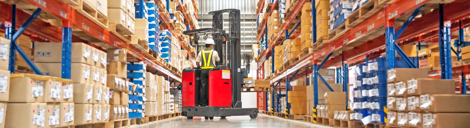 Fork lift truck working in a warehouse